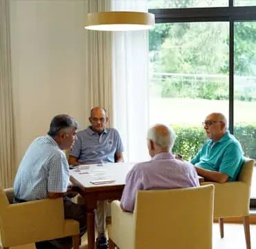 Residents playing cards together